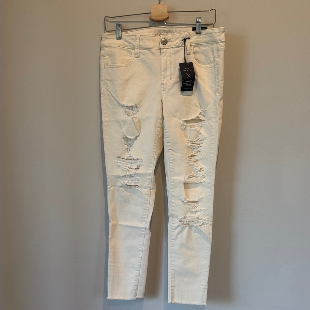 American Eagle Outfitters Cream Distressed Skinny Jeans